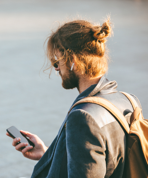 man looking at phone